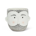Ceramic planter shaped like a stylized male face with black beard and simple facial features for home decor.