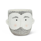 Ceramic planter shaped like a stylized male face with black beard and simple facial features for home decor.