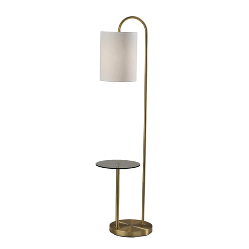 Brass floor lamp with white fabric shade and built-in round glass shelf for modern home decor and lighting