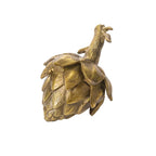 Decorative golden artichoke sculpture with detailed layered leaves and textured surface for home decor.