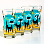 Set of four tall glasses featuring black cat artwork with retro space motifs in blue and yellow colors.