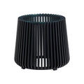 Black slatted side table with a round glass top and modern open-frame design for home decor.
