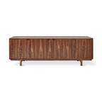 Mid-century modern walnut credenza with clean lines and ample storage on raised legs for home decor.