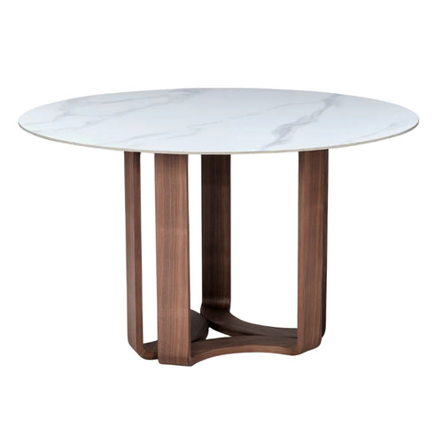 Round dining table with a white marble top and a sculptural wooden base in midcentury modern style