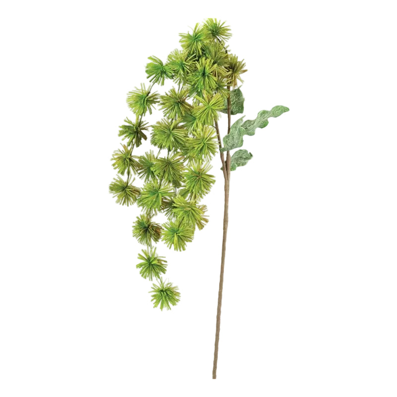 Green artificial botanical branch with clustered needle-like leaves and textured green leaves on a thin stem