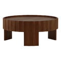 Round wooden coffee table with a raised edge and sturdy rectangular legs in a warm brown finish