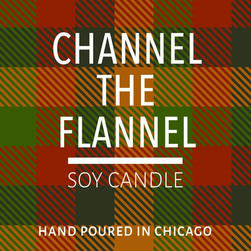 Plaid background with text promoting a hand-poured soy candle scented to channel cozy flannel vibes