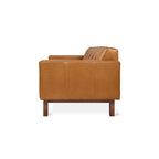 Brown leather armchair on a white background