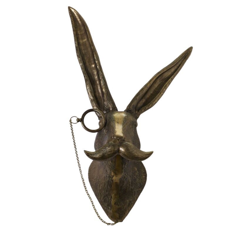 Bronze-colored wall-mounted hare sculpture featuring long ears, a mustache, and a monocle with chain detail.
