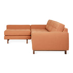 Modern burnt orange fabric loft sectional sofa with walnut-finished wooden legs and tufted back cushions