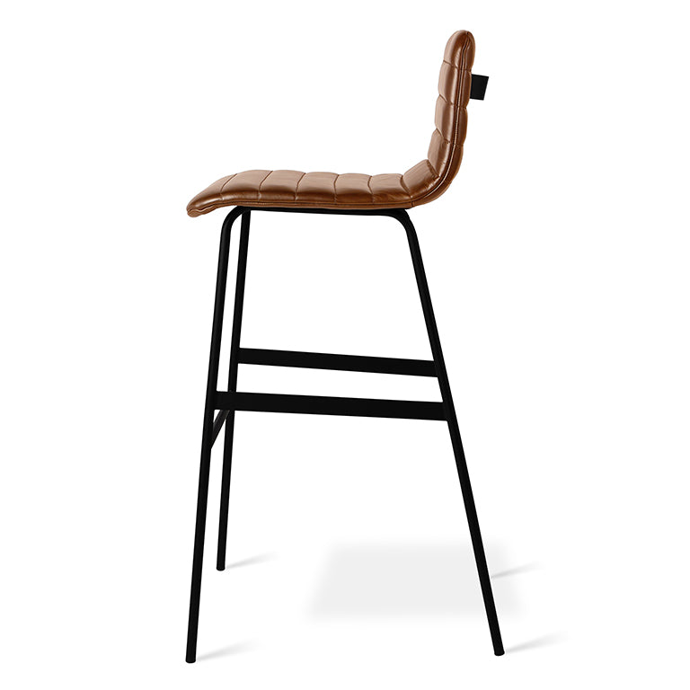 Bar stool with brown upholstered leather seat and black metal legs featuring a modern, minimalist design