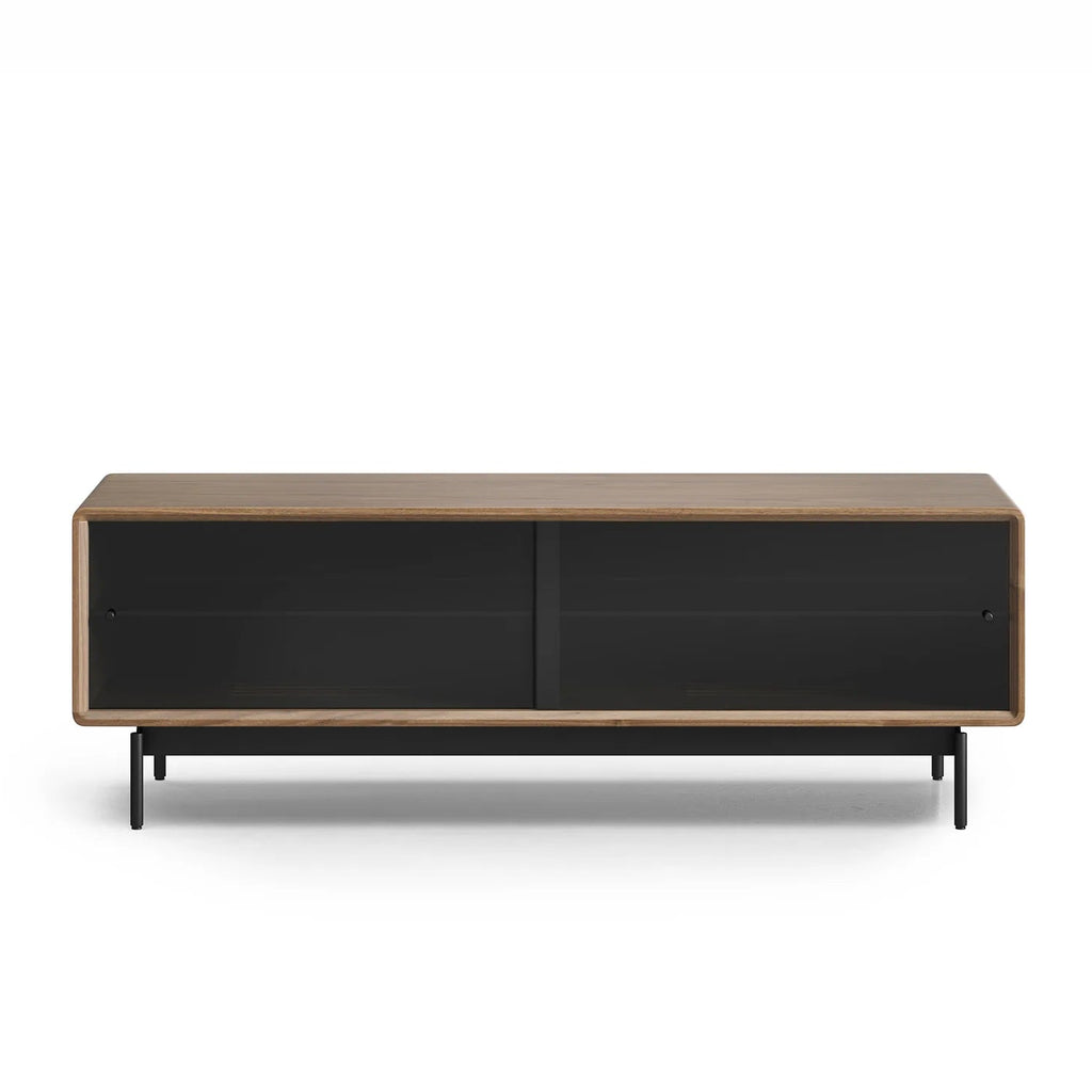 Modern low media console with wooden frame and black sliding doors on metal legs for home decor