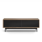 Modern low media console with wooden frame and black sliding doors on metal legs for home decor
