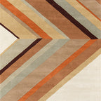 Geometric patterned rug with brown, orange, and beige colors on a white background