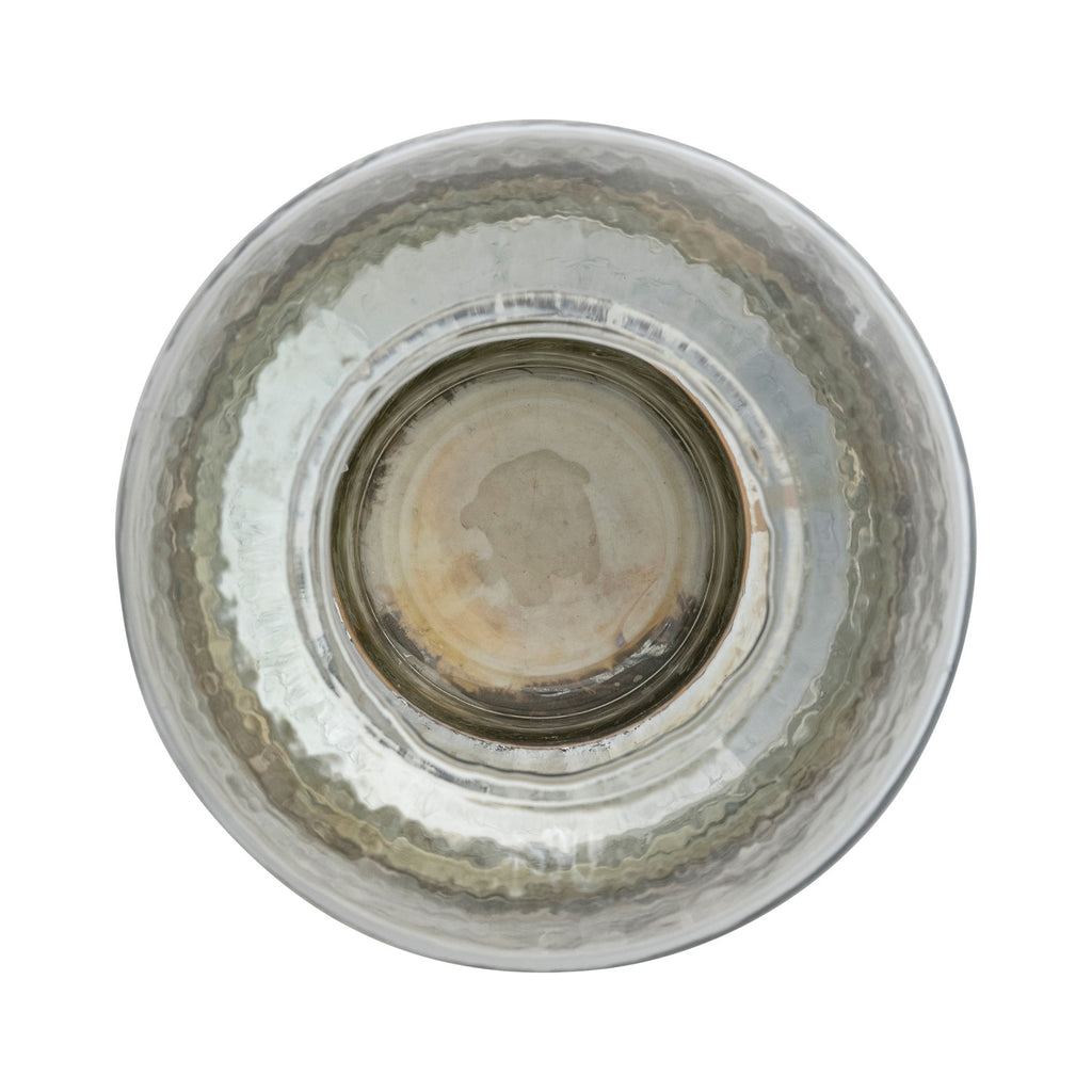Clear glass bowl with a textured interior on a white background