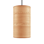 Small cylindrical pendant light with ash wood veneer finish and black hanging cord, minimalist modern design