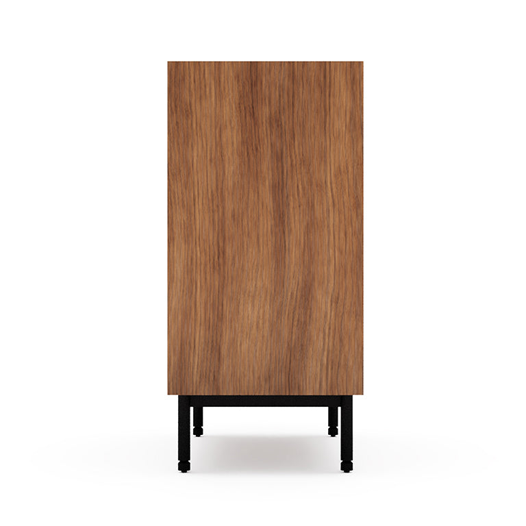 Side view of a modern wooden dresser with four drawers and black metal legs in a walnut finish