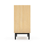 Tall wooden dresser with a light oak finish and black metal legs, showcasing a minimalist modern design.