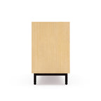 Side view of a wooden dresser with a light oak finish and black metal legs on a white background