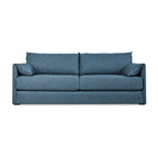 Modern blue fabric sofa with clean lines and two matching cushions on a white background
