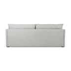 Light gray fabric sofabed viewed from the back with clean lines and minimalist modern design