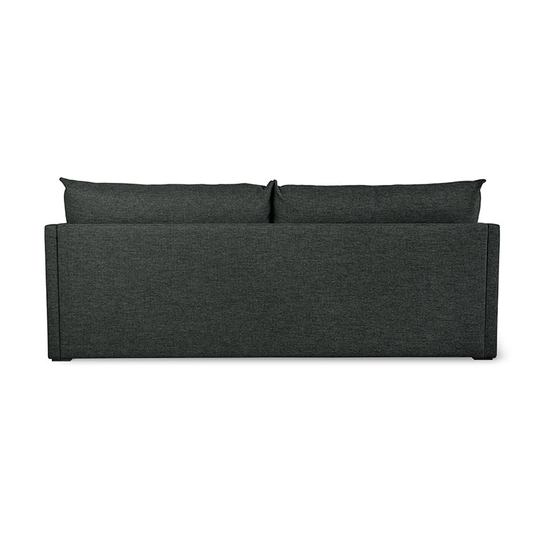 Dark gray fabric sofabed shown from the back with two plush cushions and clean lines design
