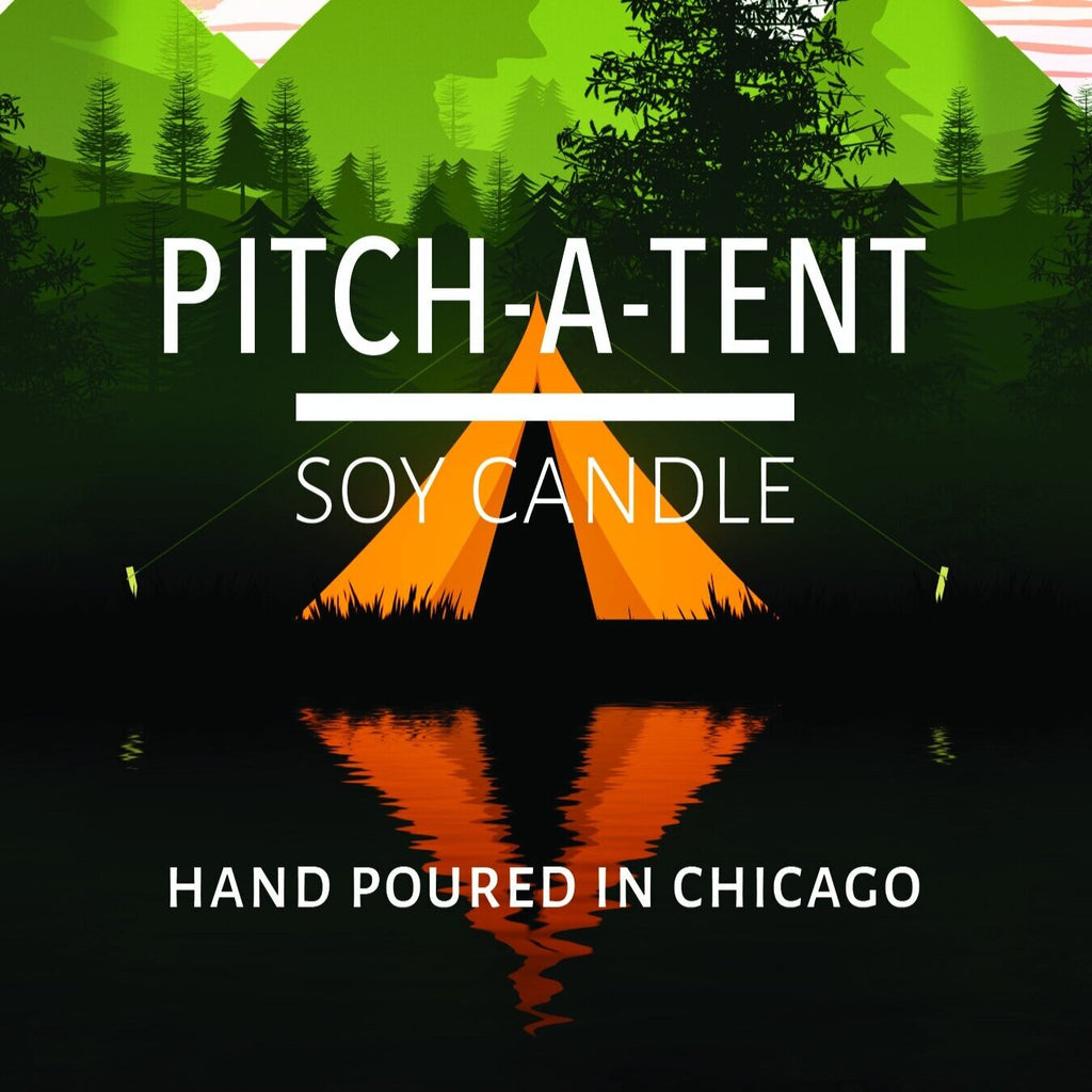 Illustration of an orange tent reflected on water with green forest and mountains background for a soy candle label.