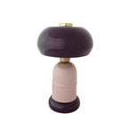 Decorative object with a purple and lavender design on a white background