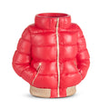 Red vase designed to resemble a shiny, quilted red puffer jacket with gold zipper details and pockets.