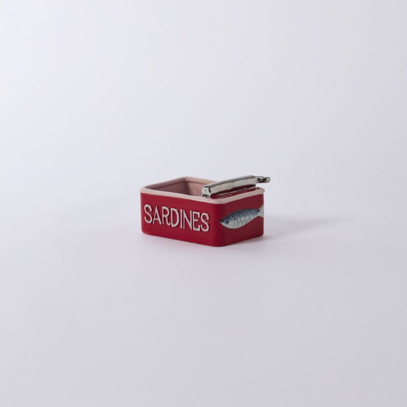 Small rectangular red planter designed to look like a sardine tin with a metal handle detail on top.