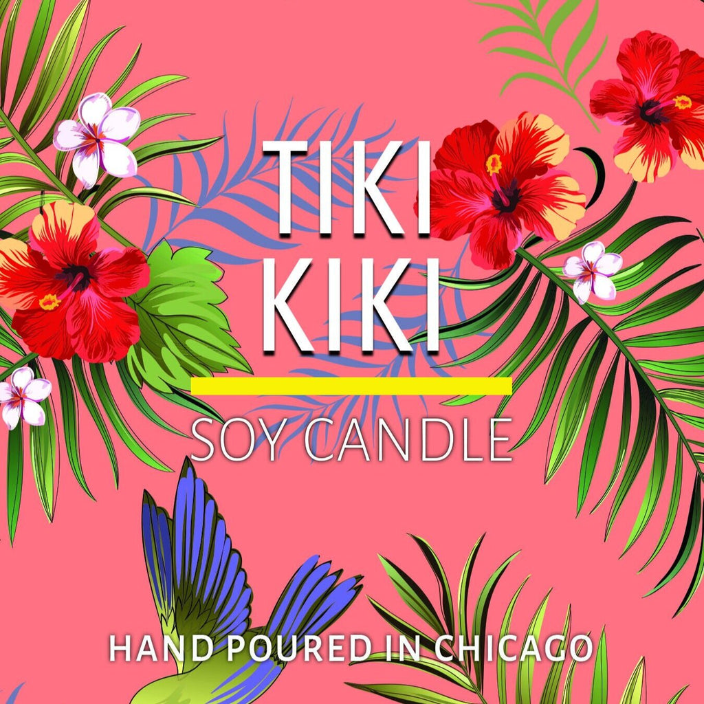 Tropical floral artwork with green leaves, red hibiscus flowers, and a blue hummingbird on a pink background.