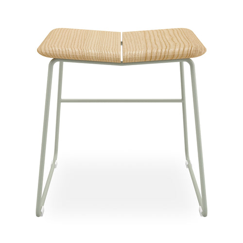 Minimalist dining stool with curved light wood seat and thin white metal frame, modern and airy design.