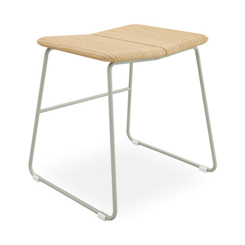 Minimalist dining stool with a light wood seat and thin metal legs in a modern design style