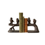 Bookend with bird design holding books on a white background