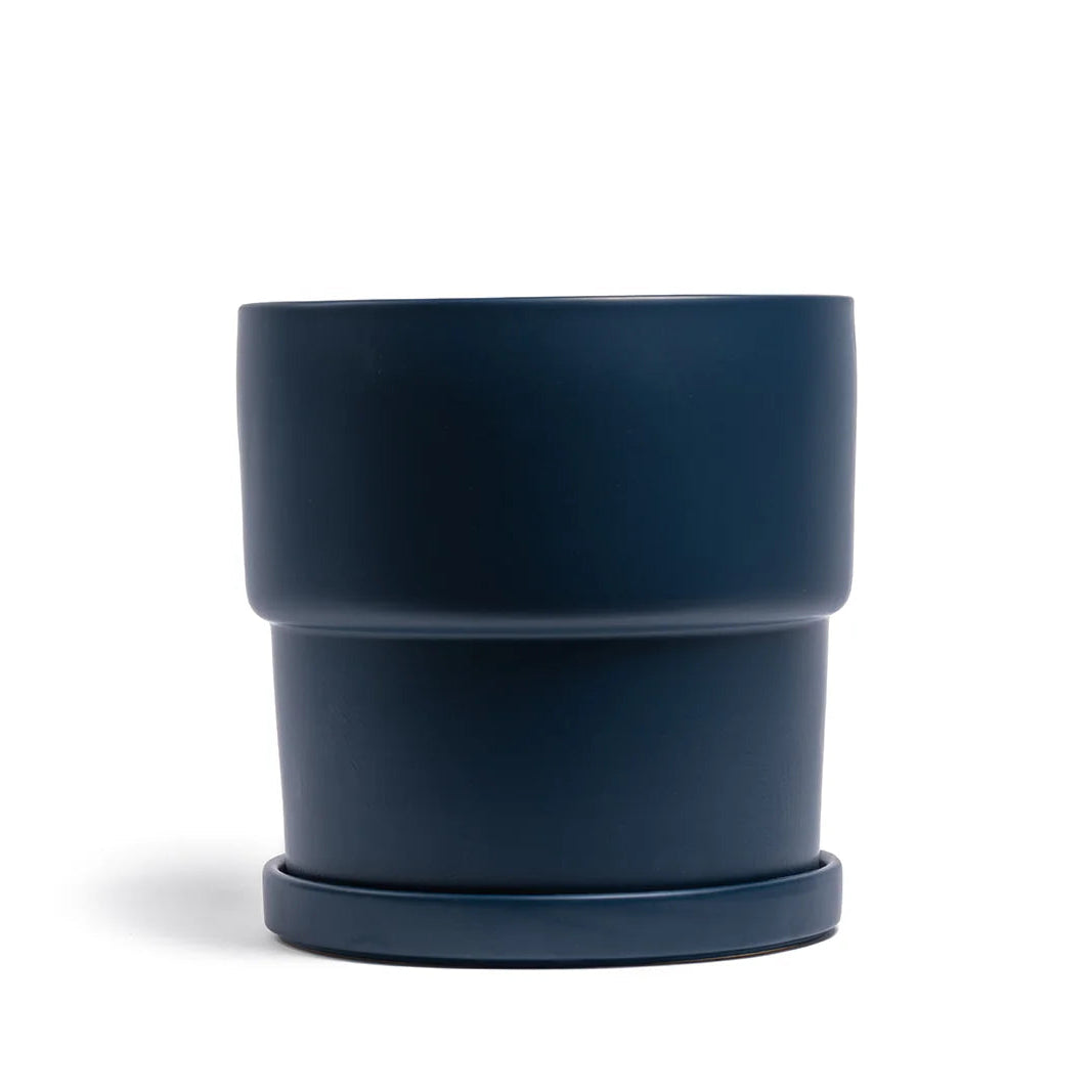 Midnight blue planter on a white background