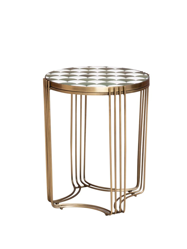 Round side table with gold metal legs and a ceramic tile top featuring a geometric pattern in neutral tones