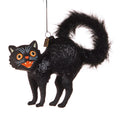 Black cat ornament with raised fur and surprised expression hanging by a string for home decor or gifts.