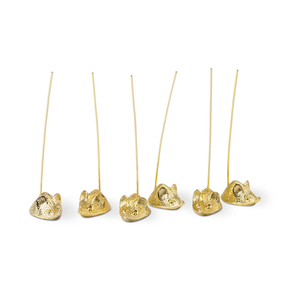 Set of six mice gold picks holders for hors d'oeurves on a white background