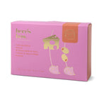 Pink packaging box with gold text and illustrations on a white background