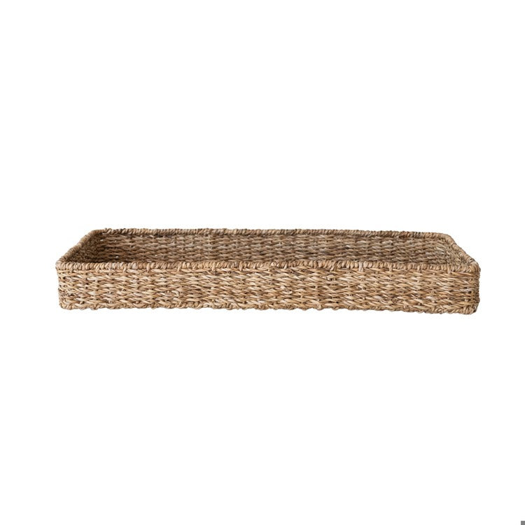 Rectangular woven seagrass tray with low sides in natural brown color for tabletop or storage use