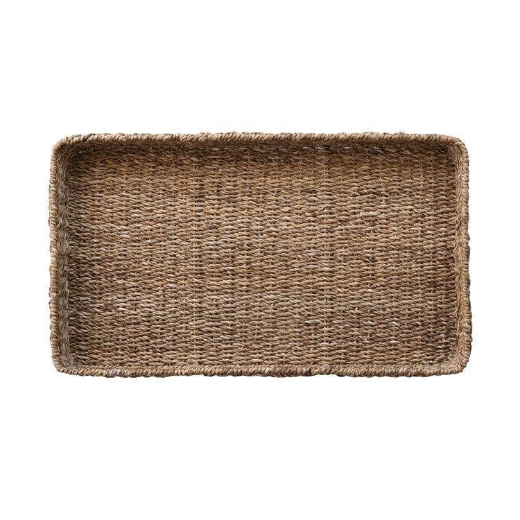 Rectangular woven seagrass tray with natural brown tones, suitable for home decor and serving purposes.
