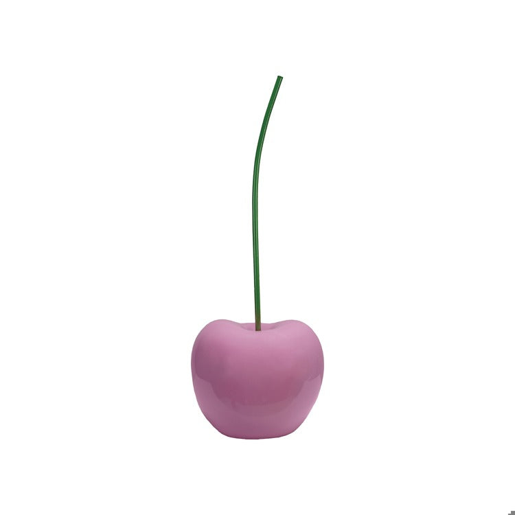 Glossy pink decorative cherry sculpture with a slender green stem, modern home decor accent piece.