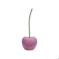 Glossy pink decorative cherry sculpture with a slender green stem, modern home decor accent piece.