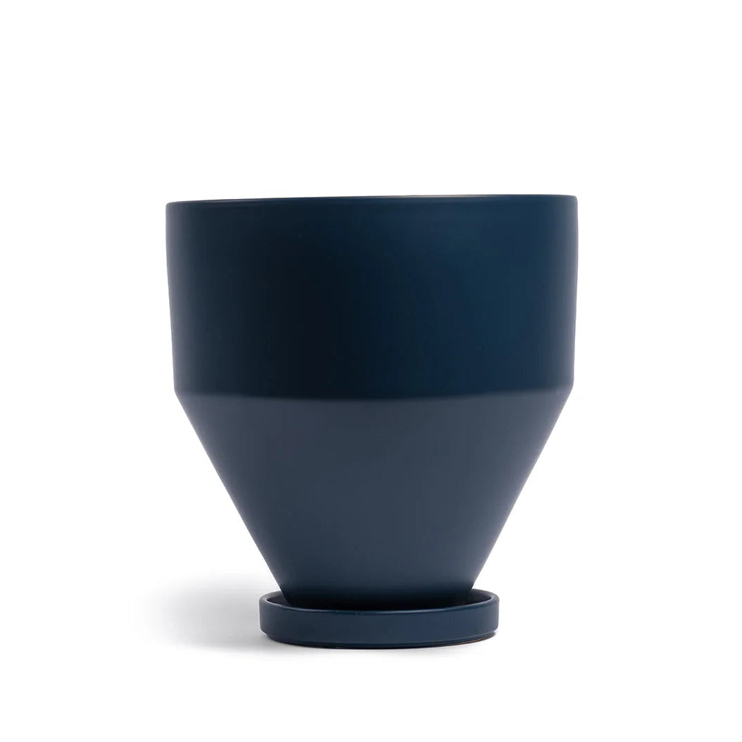 Midnight ceramic pot with drip tray on a white background