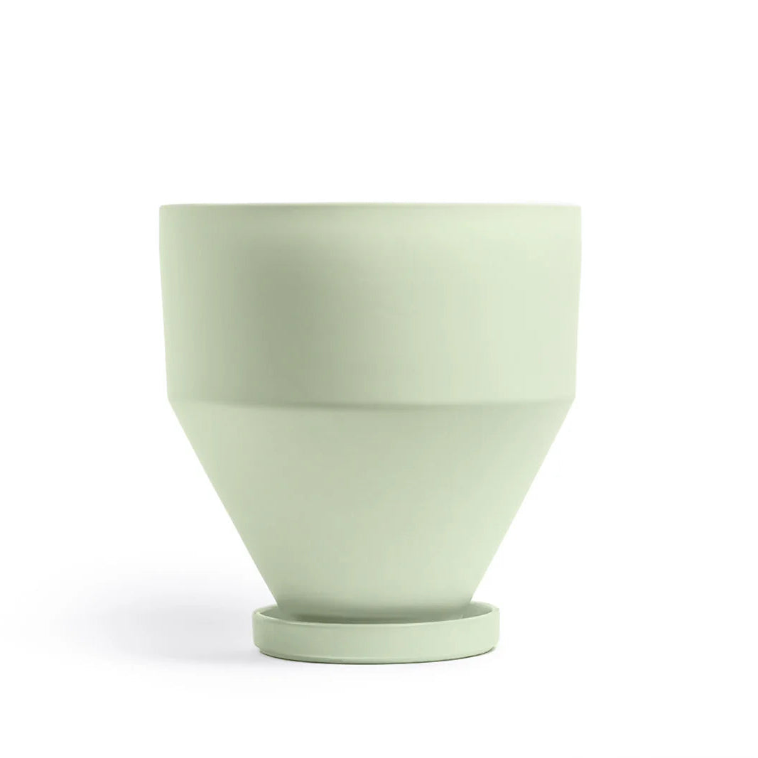 Sage ceramic pot with drip tray on a white background
