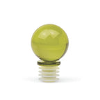 A translucent olive green glass sphere knob with a white ridged metal or plastic base, shown on a clean white background.