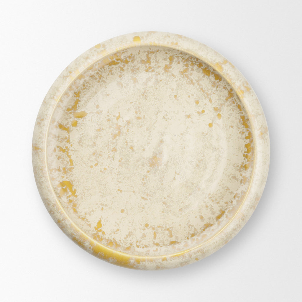 A round ceramic plate with a textured, speckled glaze in cream, beige, and light yellow tones, photographed from directly above on a clean white background.