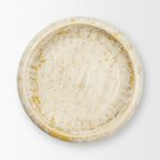A round ceramic plate with a textured, speckled glaze in cream, beige, and light yellow tones, photographed from directly above on a clean white background.