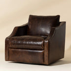 Brown leather armchair on a beige background