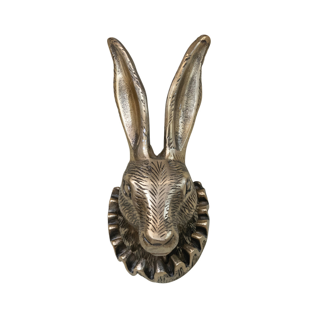 Decorative metallic rabbit head on a white background